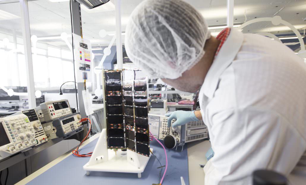Spire nano satellite undergoing testing