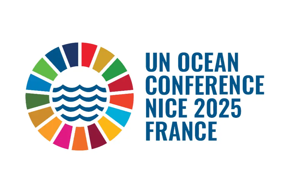 Logo for the UN Ocean Conference Nice 2025 France, featuring a circular icon with multicolored segments and ocean wave symbols in the center, with event text on the right.